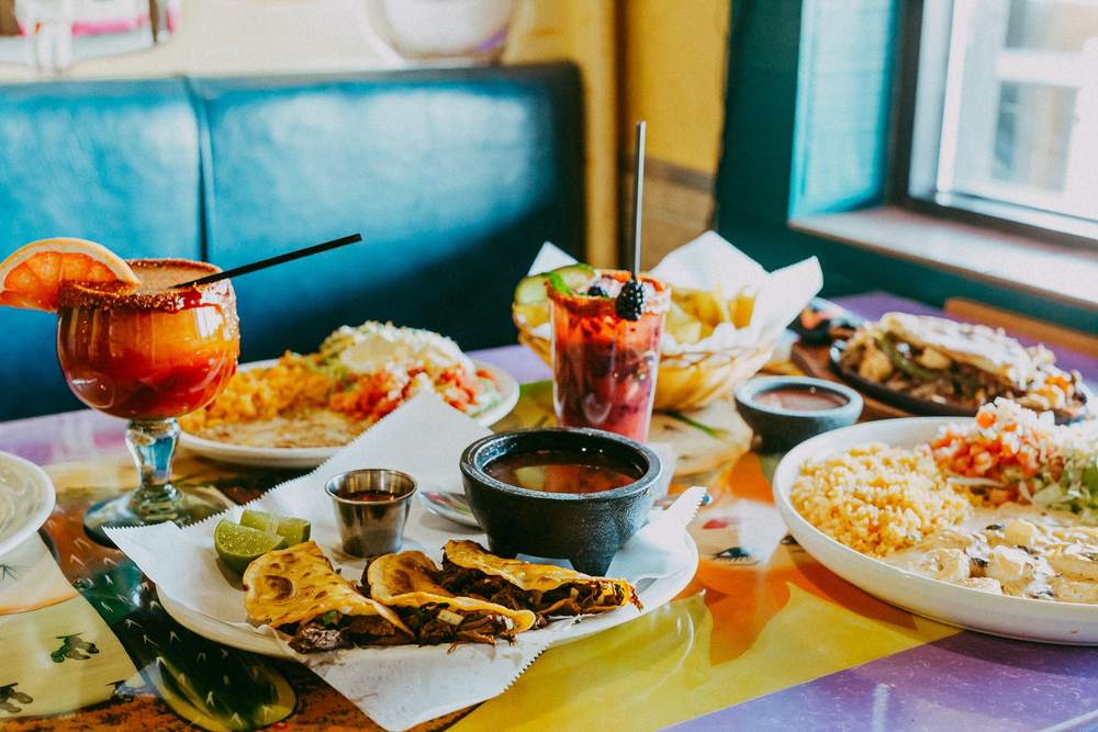 Tacos and rice prepared at El Patron